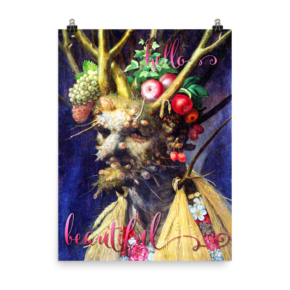 A face with horns, fruit, and green ivy with the words Hello Beautiful in pink on a poster.  