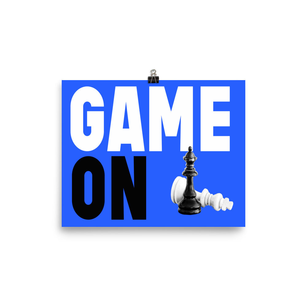 Block letters of Game On on blue background with king and queen game pieces on poster. 